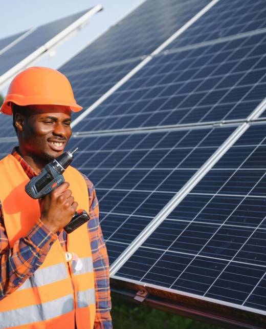 portrait-african-american-electrician-engineer-safety-helmet-uniform-installing-solar-panels_255667-74480